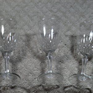 Elegant set of two stemmed cut glass wine glasses